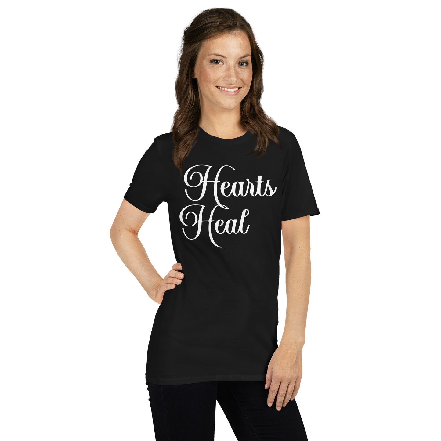 Woman wearing black Hearts Heal Words t-shirt.