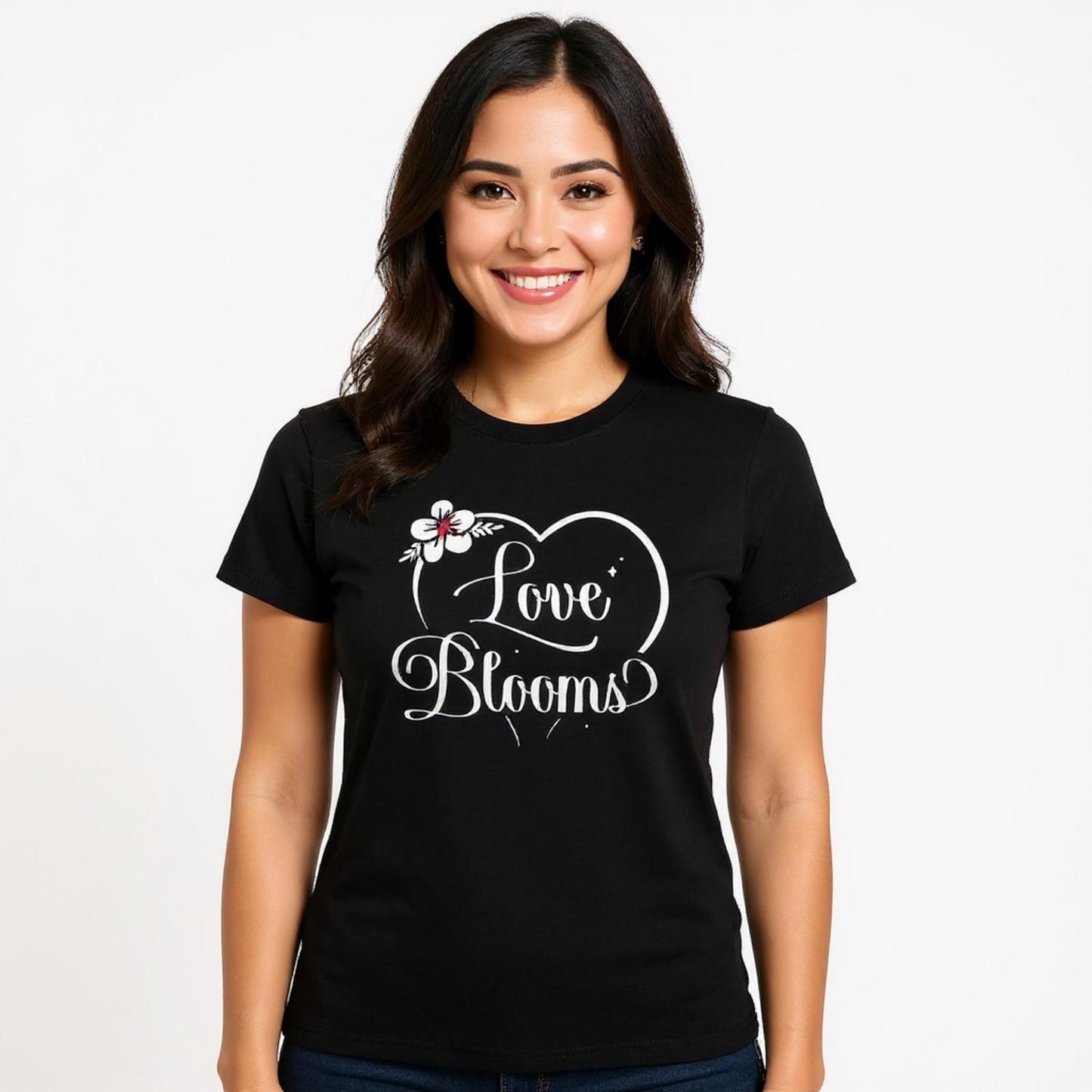 Woman wearing a black t-shirt Love Blooms heart design.
