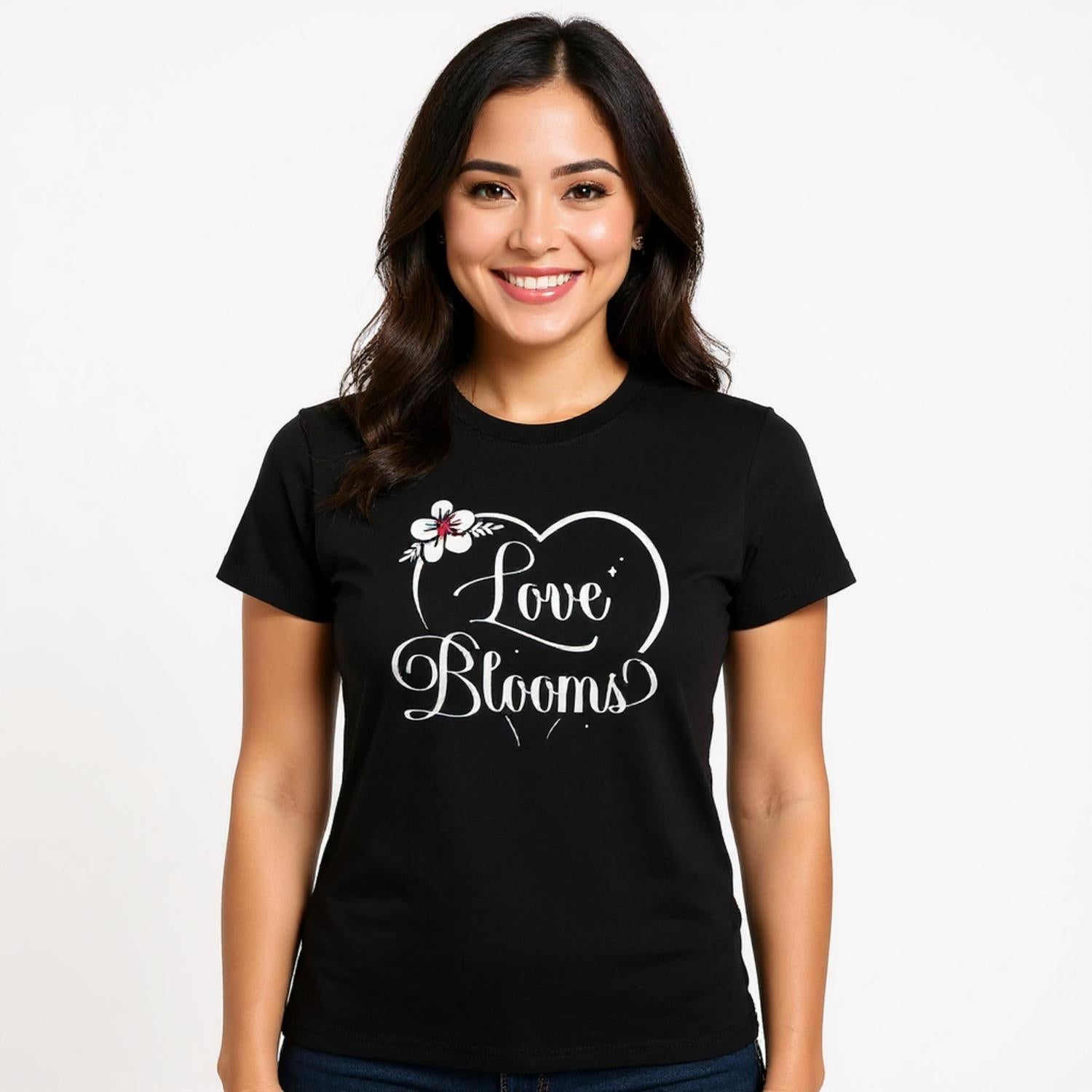 Woman wearing a black t-shirt Love Blooms heart design.