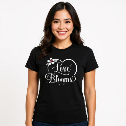 Woman wearing a black t-shirt Love Blooms heart design.