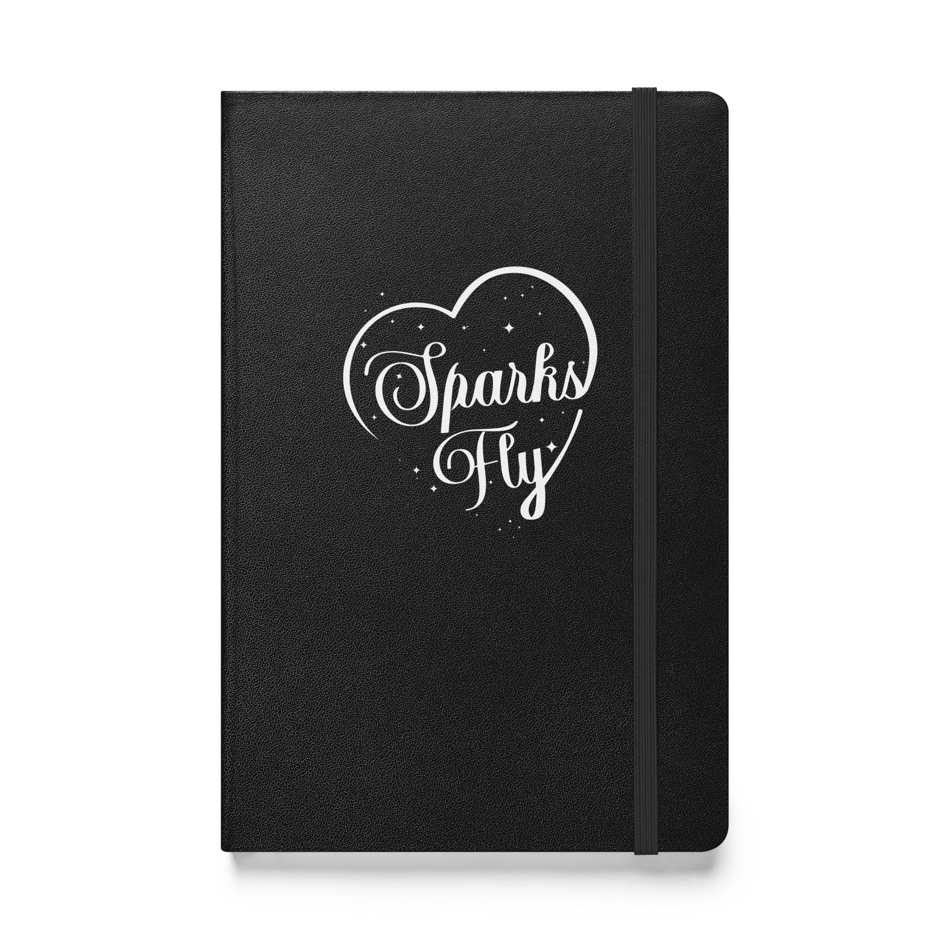 Black hardcover notebook with the words Sparks Fly inside a heart.