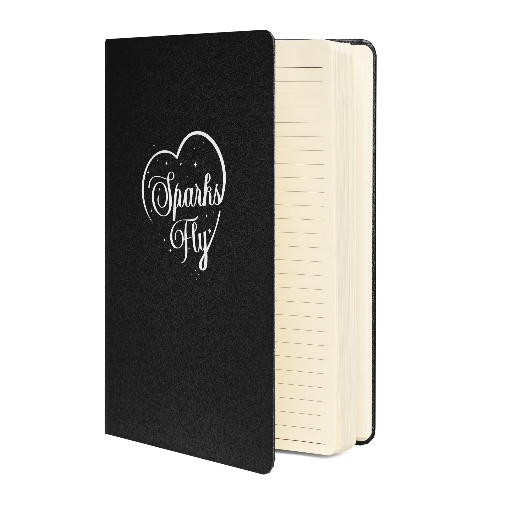 Black hardcover Sparks Fly Heart notebook with lined, cream-colored pages.