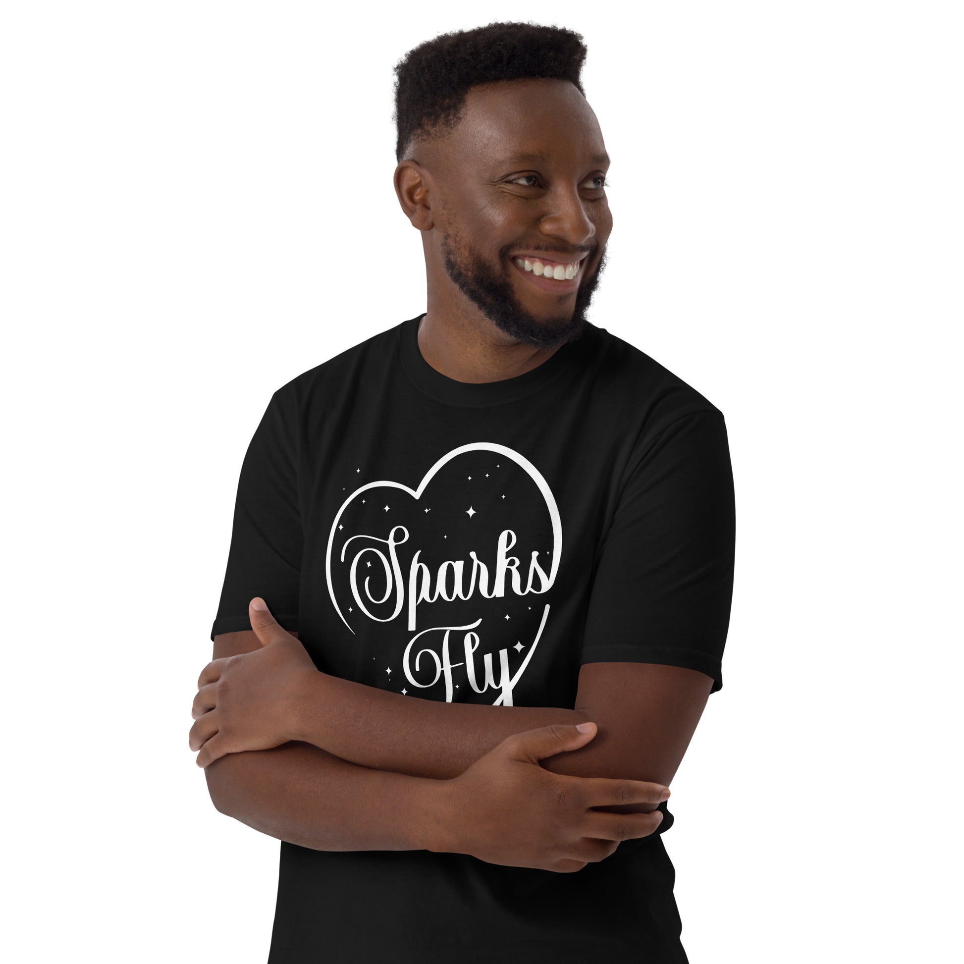 Smiling man wearing black Sparks Fly Hearts t-shirt.