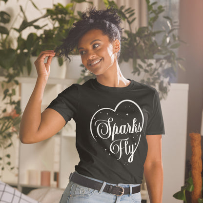 Woman wearing black Sparks Fly Hearts t-shirt.