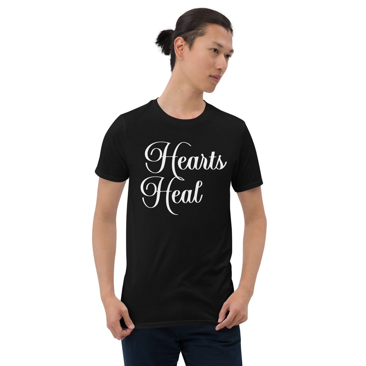 Man wearing black Hearts Heal Words t-shirt.