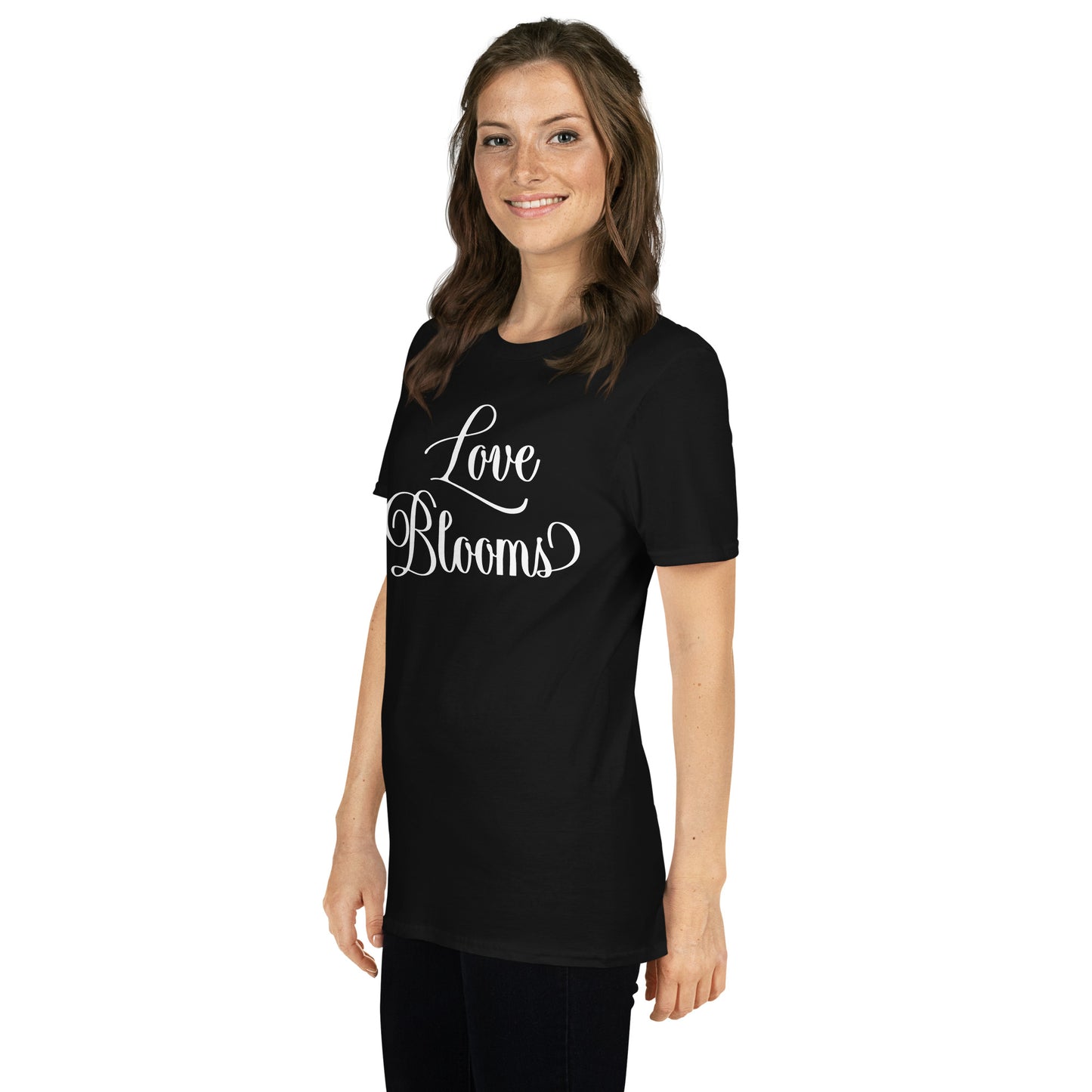 Woman wearing black Love Blooms Words t-shirt.