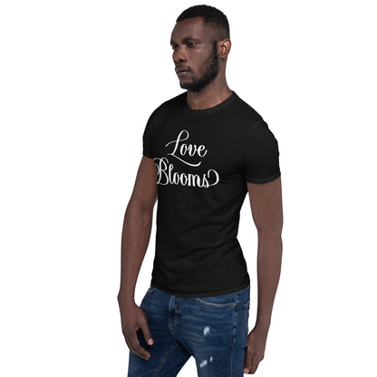 Man wearing black Love Blooms Words t-shirt.